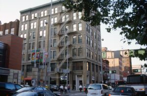 apartment building with shops underneath